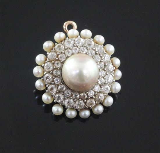 A late 19th/early 20th century American Theodore. B. Starr gold, cultured pearl and diamond set circular pendant brooch, 24mm.